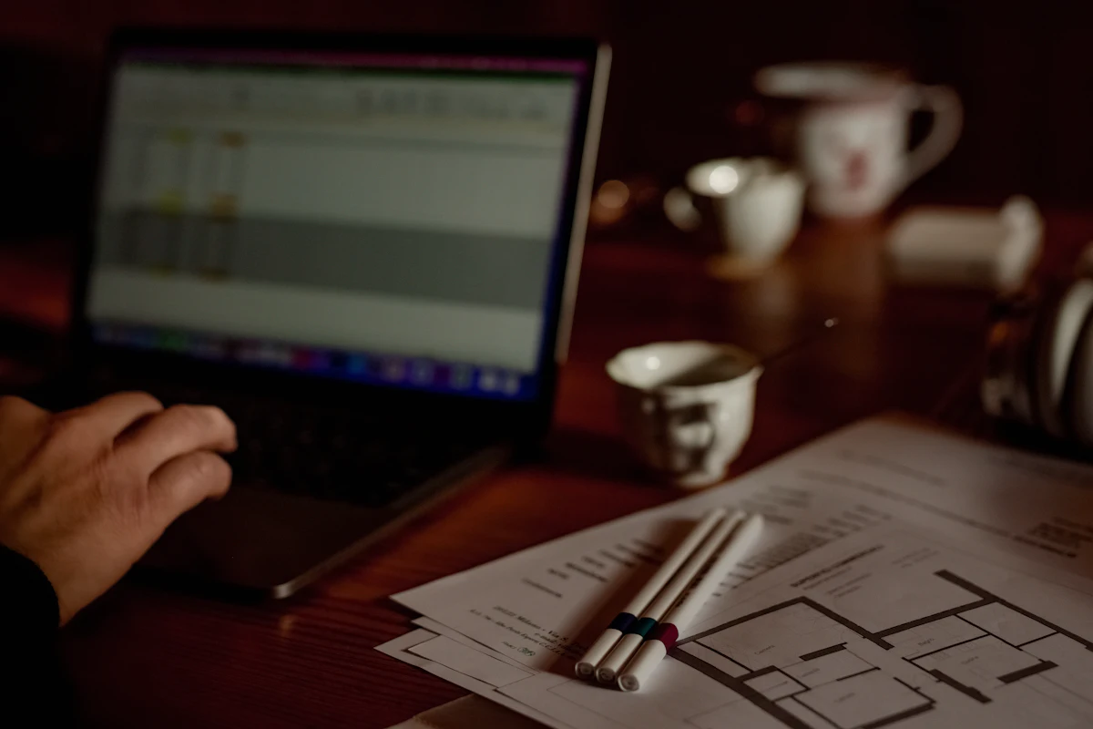 Workstation with a laptop used to illustrate planning and editorial work