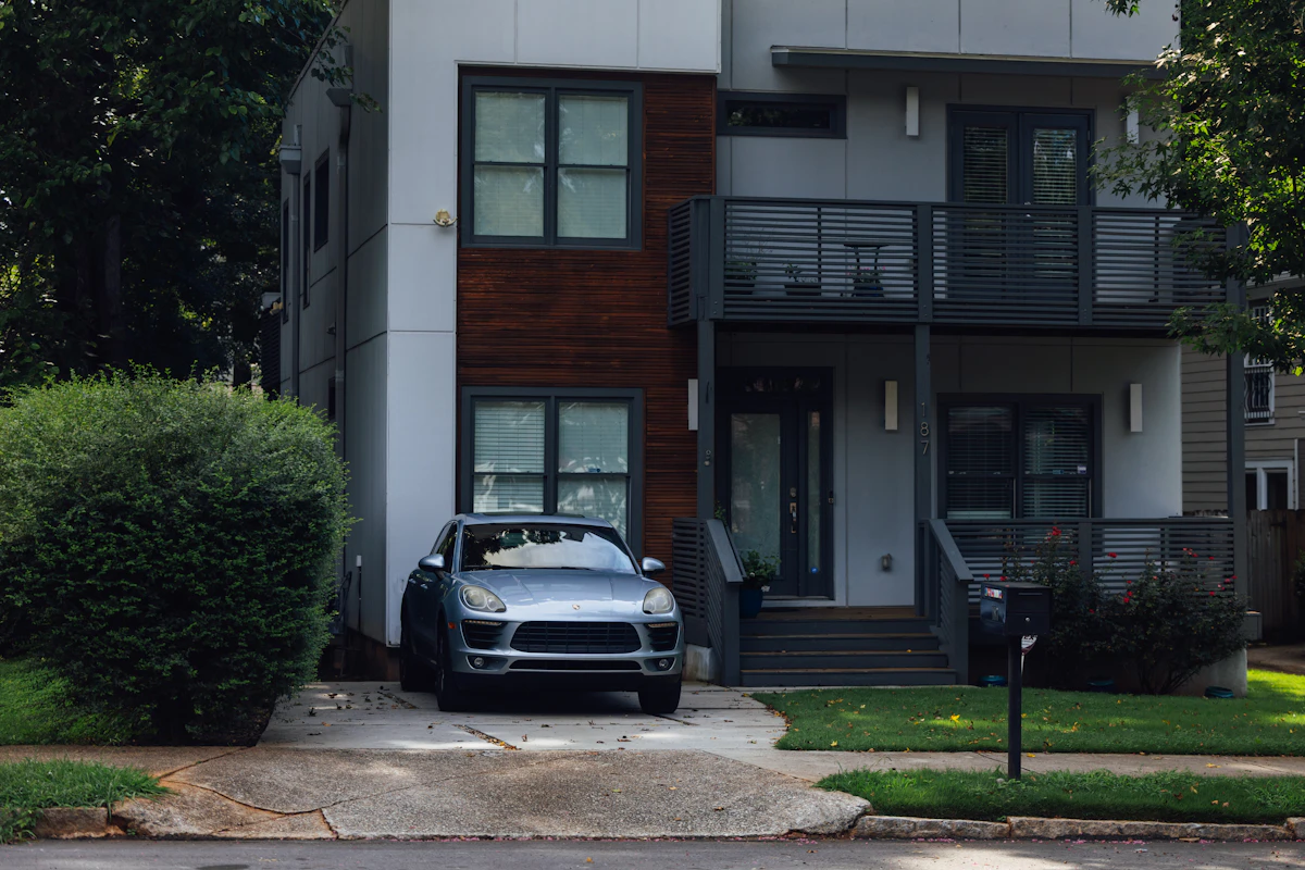 Contemporary two-story suburban house illustrating home addition cost planning across U.S. regions